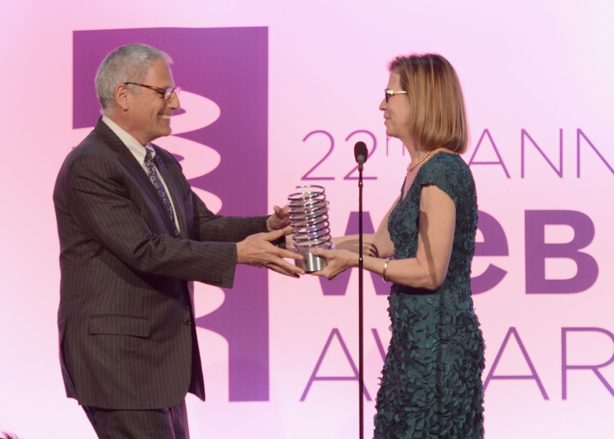 Annie Griffiths (R) presents National Geographic CEO Gary Knell onstage at The 22nd Annual Webby Awards