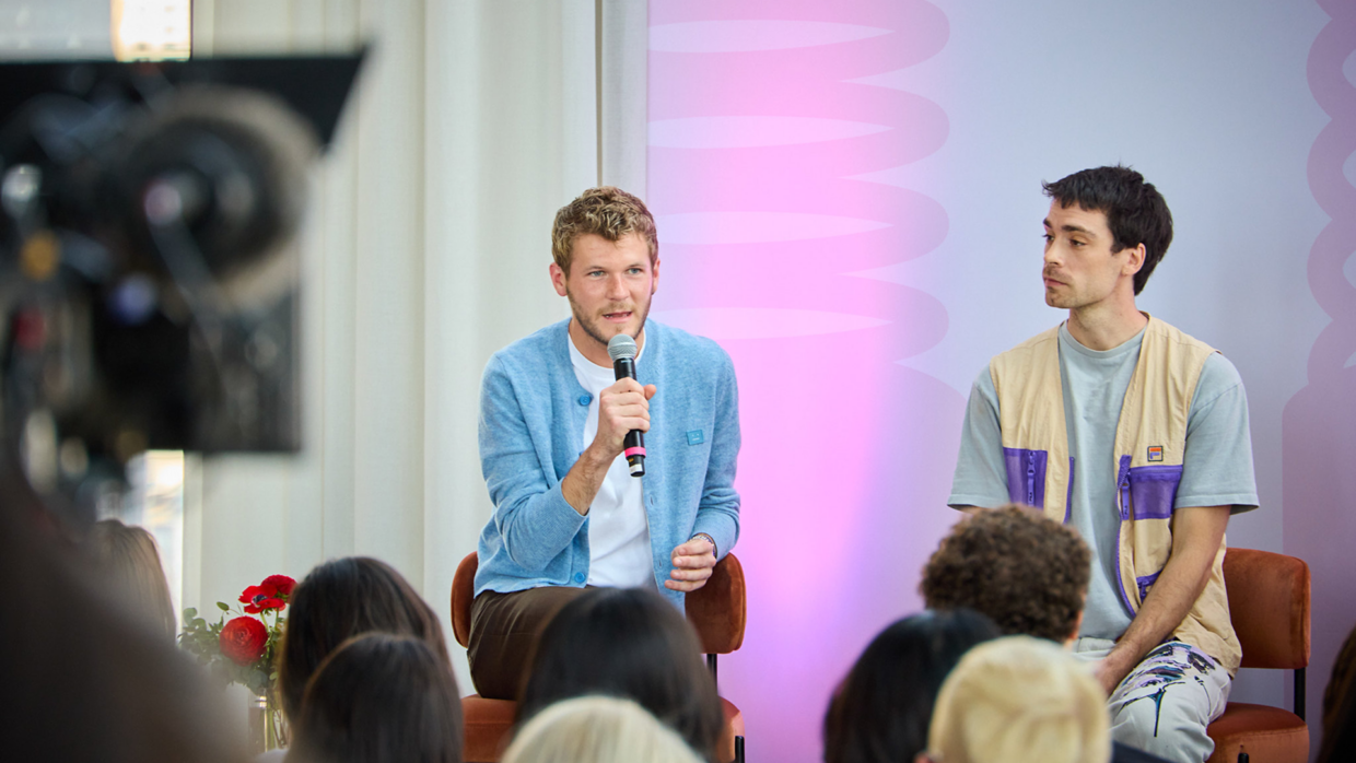 Davis Burleson (L) speaks alongside Caleb Simpson (R) 
